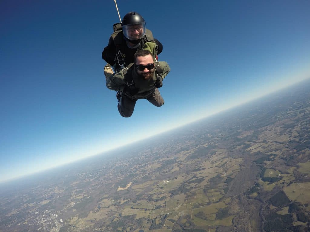 two men tandem skydiving