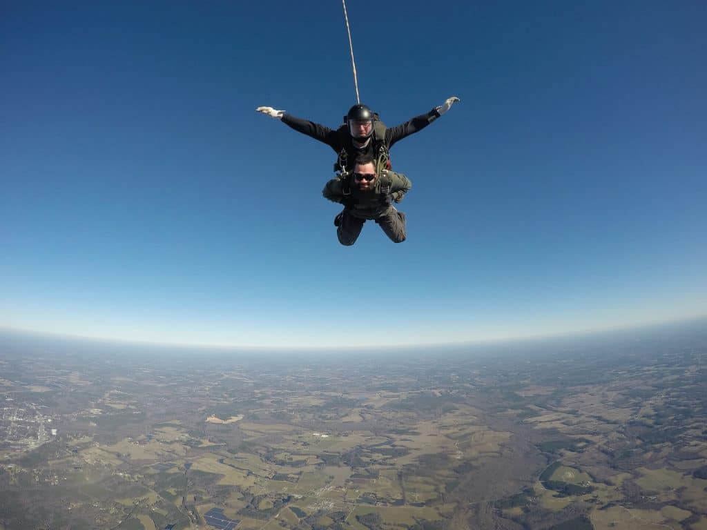 two men tandem skydiving